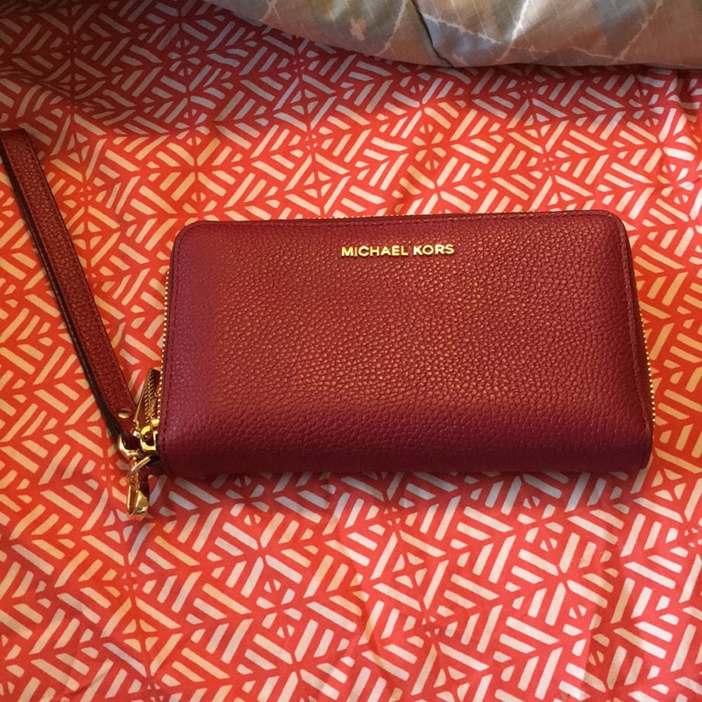 Michael Kors burgundy wristlet